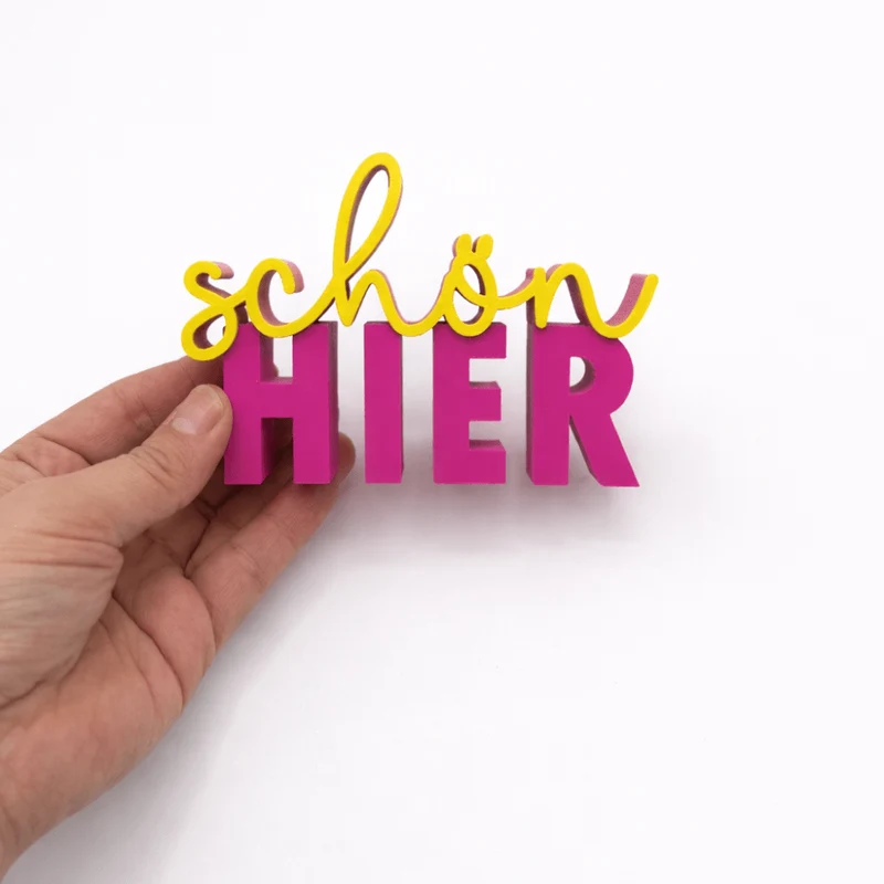 3D-Drucker Schriftzug „schön hier“ – Pink-Gelb