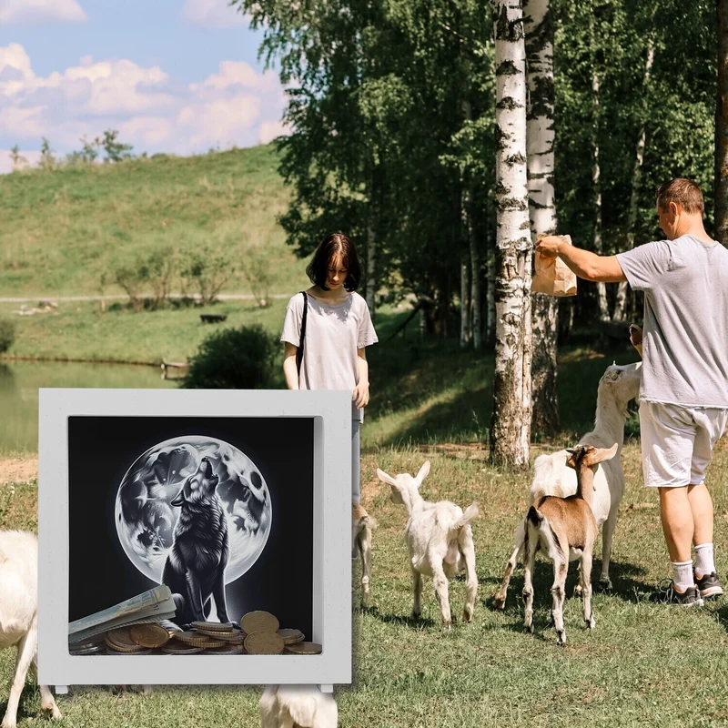 Sitzender Wolf im Mondschein Spardose