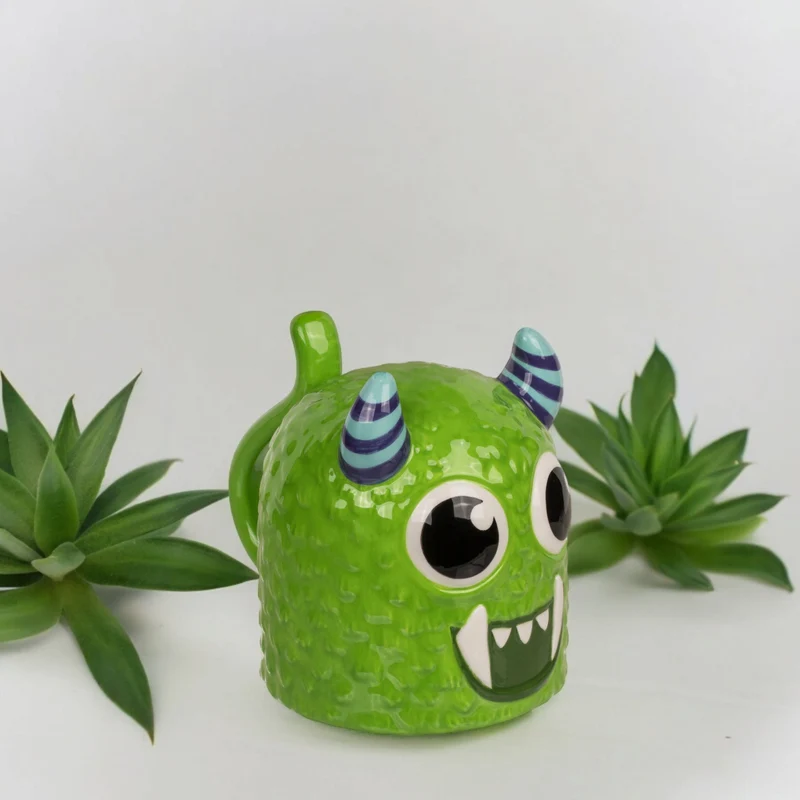 Grünes Monster kopfüber Kaffeebecher Kindertasse aus Keramik