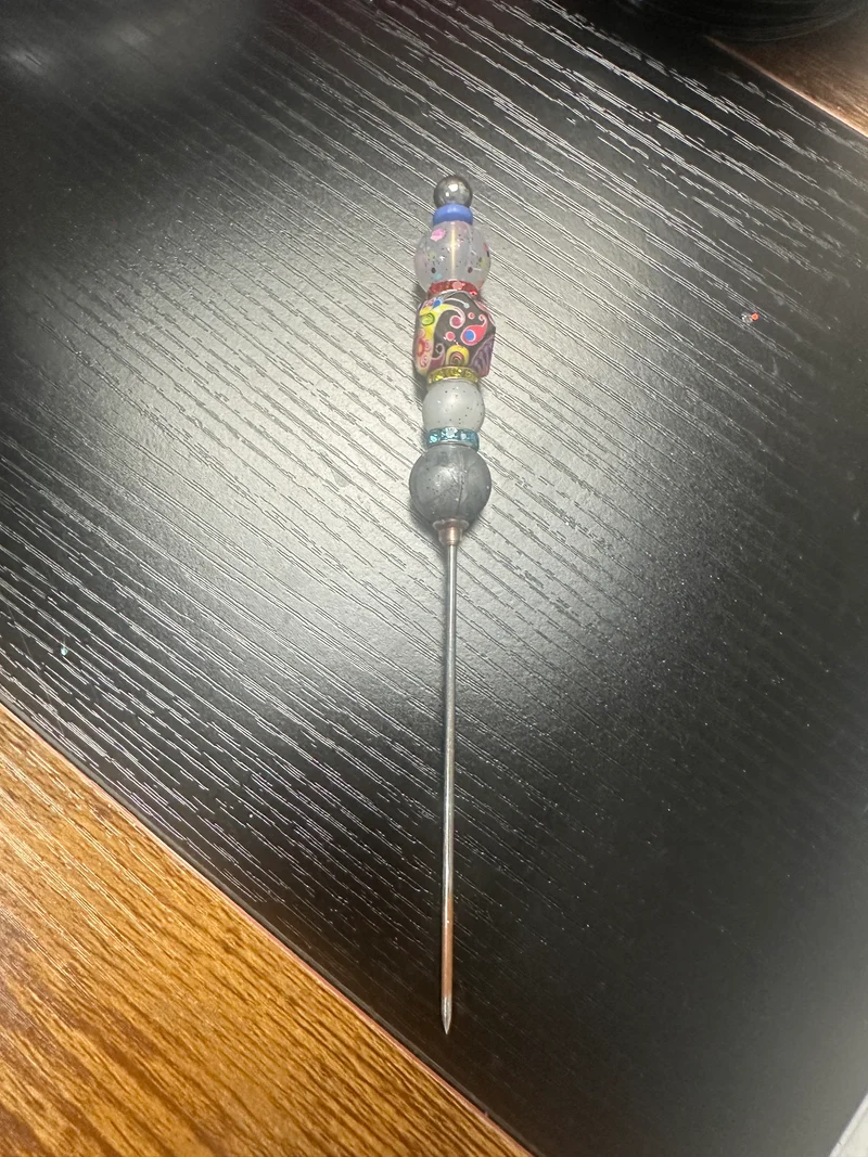 Beadable poker tool