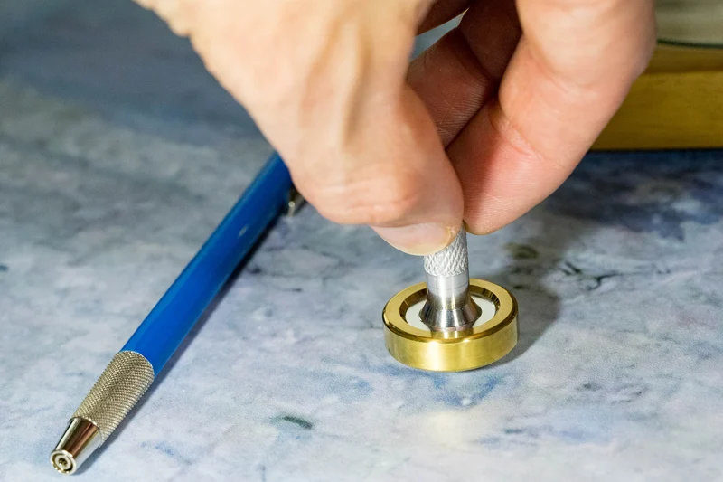 Schulte Fused Aluminum & Brass Spinning Top