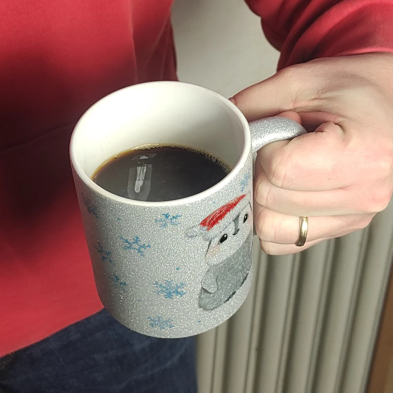 Pinguin mit Weihnachtsmütze Kaffeebecher