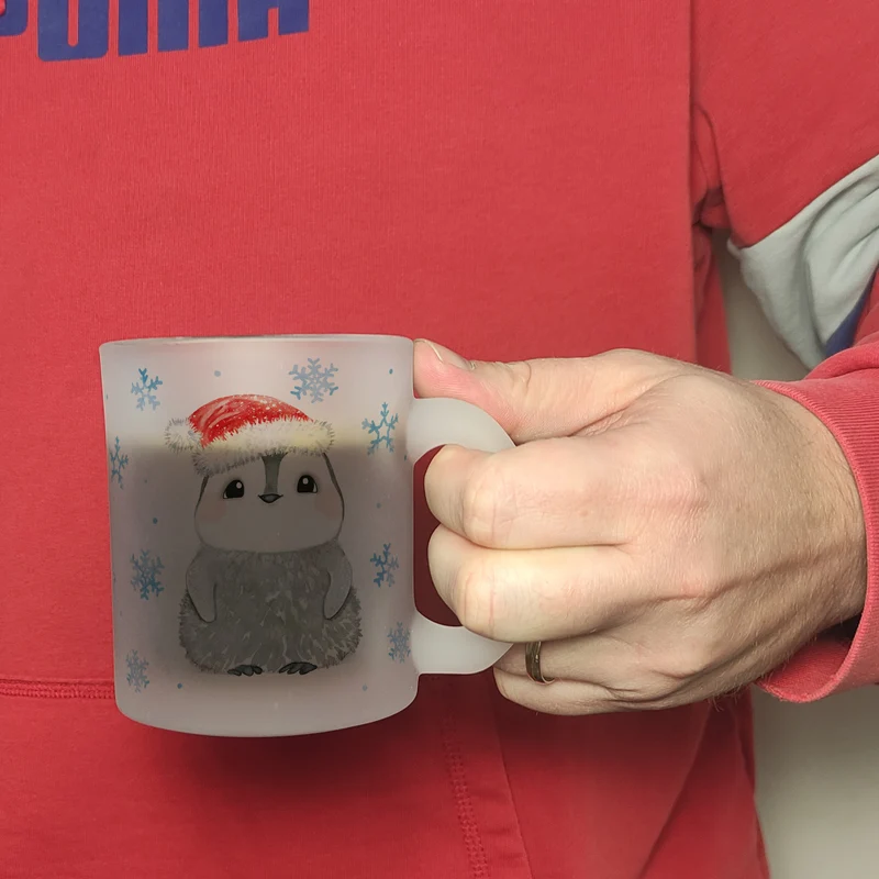 Pinguin mit Weihnachtsmütze Kaffeebecher