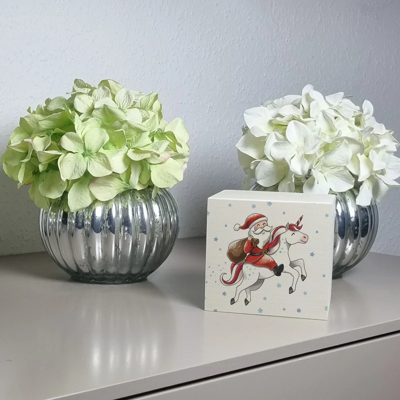 Weihnachtsmann auf Einhorn Spardose
