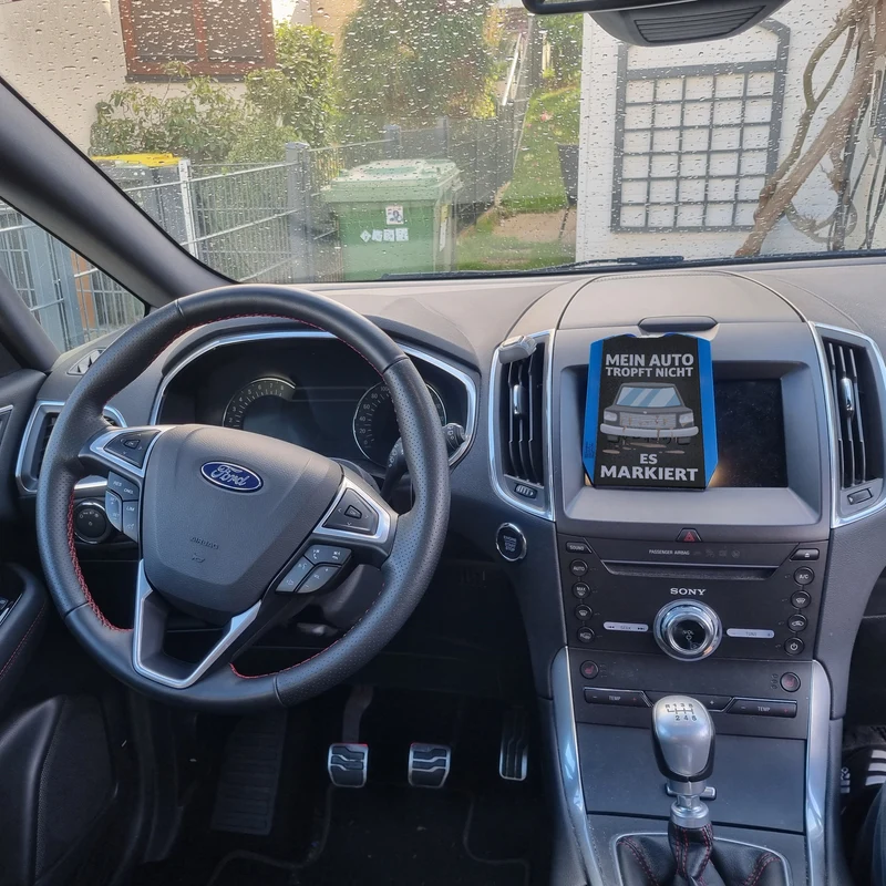 Auto tropft nicht - es markiert Parkscheibe in grau mit 2 Einkaufswagenchips