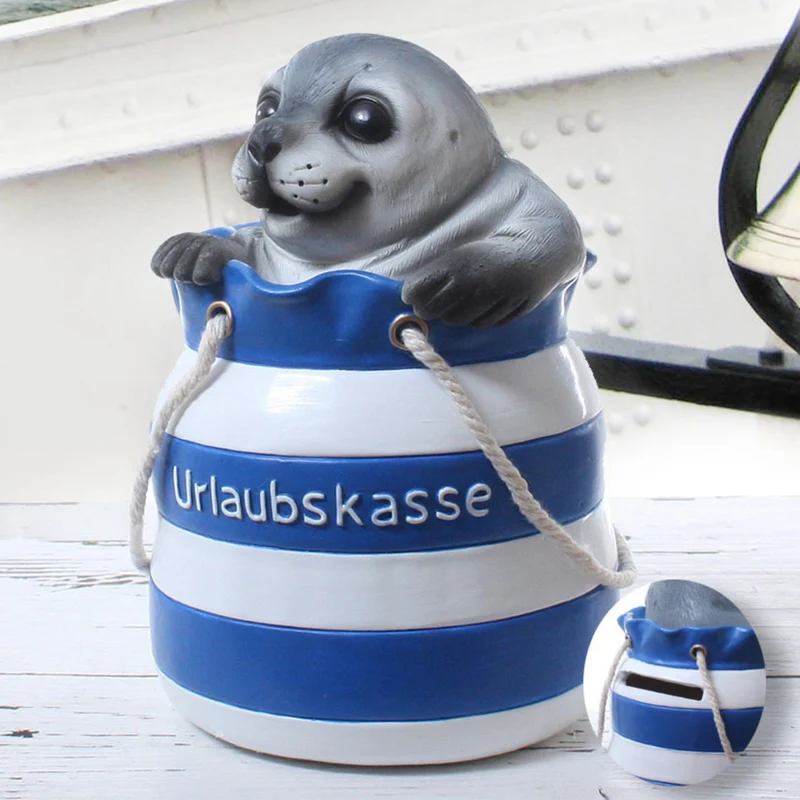 Robbe in Strandtasche Spardose