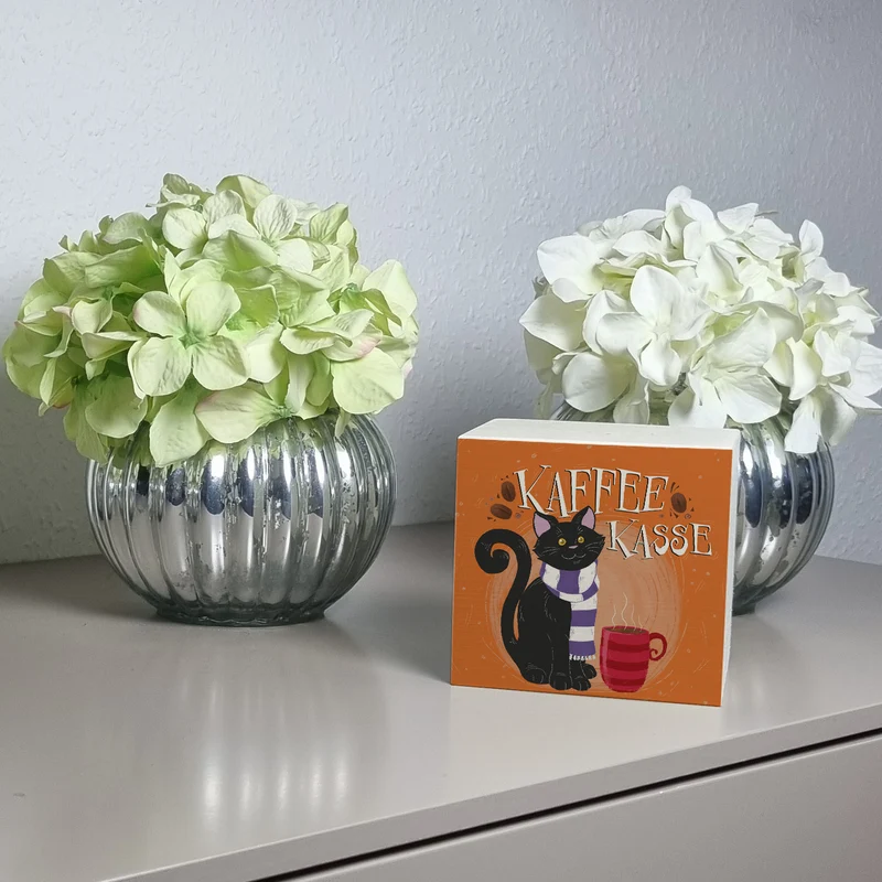 Herbstliche Kaffeekasse Spardose mit schwarzer Katze