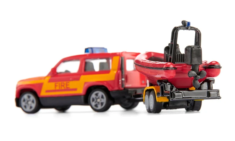 Modellauto SIKU Land Rover Defender mit Boot – Feuerwehr Set